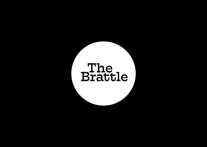 Black background with a white circle in the middle that says "The Brattle" in black font